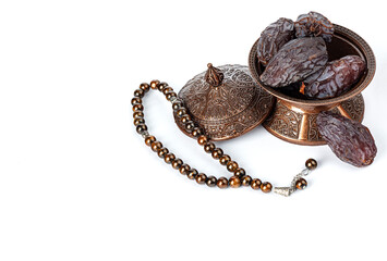 Dates on a bronze plate isolated