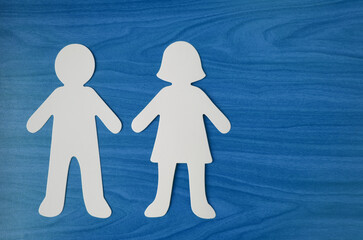 Paper cutout of a man and woman