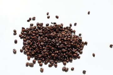 Textured background with robusta and arabica coffee beans closeup. Every day, people drink aromatic...