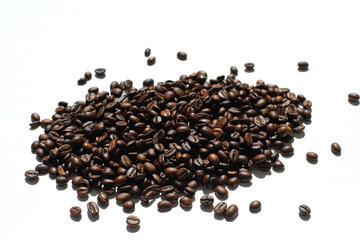 Textured background with robusta and arabica coffee beans closeup. Every day, people drink aromatic strong espresso in the morning. A popular world tradition in every country. Macro view backdrop