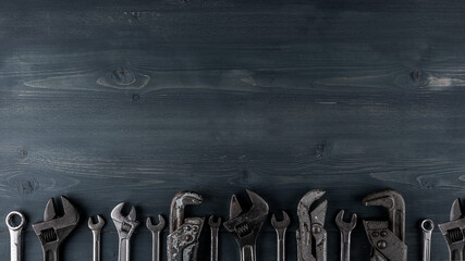 Plumbing Industrial Template. Grey and Blue Background with different tools. Copy space