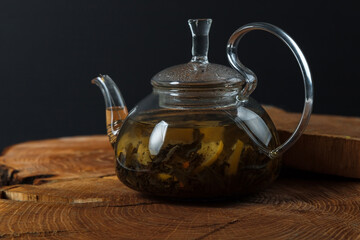 aromatic hot cinnamon tea on wooden table