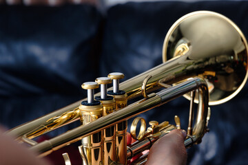 Obraz na płótnie Canvas Trumpet. Close up of a trumpet, blurred background 
