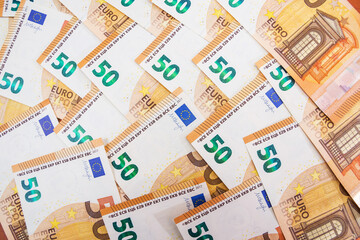 Fifty Euro banknotes background of Euro currency in Europe.