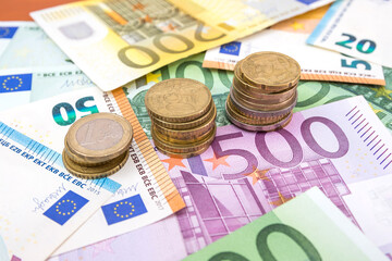 euro banknotes and coins.