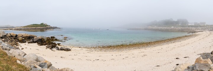 Fototapeta na wymiar Coast near Plouguerneau on a foggy day in summer