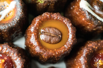 Caneles de bordeaux is a small pastry with rum and vanilla, traditional French sweet dessert.