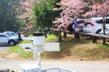 Weather station or a meteorological instrument with solar cell system to measure the wind speed.