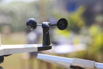 Weather station or a meteorological instrument with solar cell system to measure the wind speed.