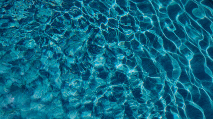 Abstract pool water.  Swimming pool bottom caustics ripple and flow with waves background surface...