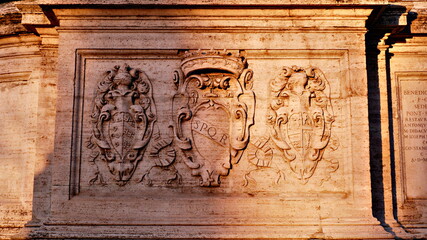 Ancient bas-relief on funerary stele from Kerameikos in Athens, Greece depicting standing man and woman.