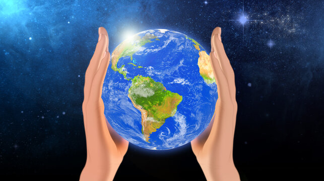 Earth in hands. Green planet on hand. Save of earth. Environment concept for background web or world guardian organization. Elements of this image furnished by NASA