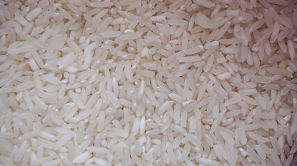 A close up of uncooked rice.
