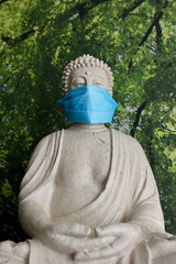 Buddha mit Maske in Coronazeiten