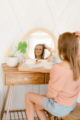 Portrait of a young woman relaxing at home