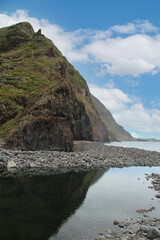 Reflection water stony coast of Madeira Portugal