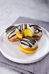 Donat labu or pumpkin doughnuts or donuts is a classic recipe for super soft and fluffy doughnuts made using mashed pumpkin.