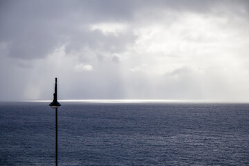 Streetlight in front of the sea