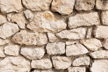 Close up of a brown stone wall.