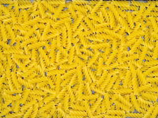  Italian pasta (Gomiti Rigati) on white background