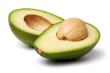 Halved Green avocado with seed isolated on a white background with clipping path