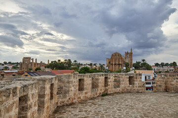 Fototapeta na wymiar Famagusta fortress built by the Lusignan Kingdom of Cyprus in the 14th century, and redesigned by Republic of Venice in 15th and 16th c., with view to Famagust and its medieval ruins