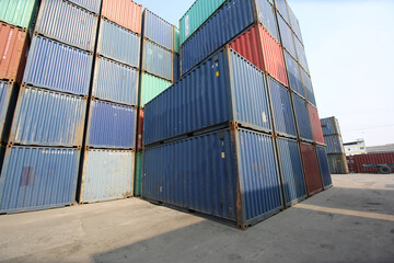 Containers box from Cargo at harbor.Foreman control Industrial Container Cargo freight ship at industry.Transportation and logistic concept.