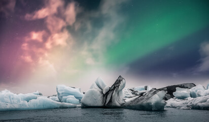 Northern lights aurora borealis over Jokulsarlon glacier ice lagoon in Iceland