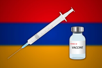 Syringe and vaccine vial on blur background with Armenia flag,