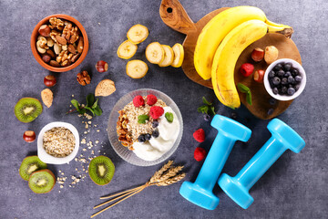 bowl with granola, berries,  nuts and yogurt