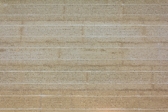 wall made of rammed earth clay elements Stock Photo | Adobe Stock