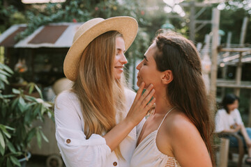 Two lesbian women kissing