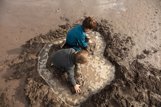 Kids Playing With Mud 