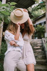 Two lesbian women kissing