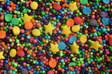 Fototapeta na wymiar Background Multi-colored Sugar sprinkle dots, decoration for cake and bakery.Easter decoration.Beautiful soft background.