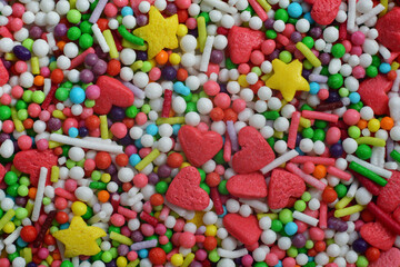 Background Multi-colored Sugar sprinkle dots, decoration for cake and bakery.Easter decoration.Beautiful soft background.