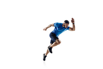 In air. Caucasian professional male athlete, runner training isolated on white studio background. Muscular, sportive man. Concept of action, motion, youth, healthy lifestyle. Copyspace for ad.