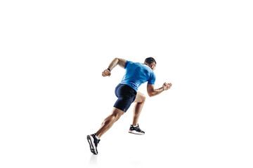 Fototapeta na wymiar In jump. Caucasian professional male athlete, runner training isolated on white studio background. Muscular, sportive man. Concept of action, motion, youth, healthy lifestyle. Copyspace for ad.