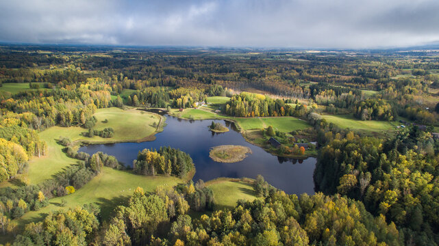 Aerial shot of beautiful Karula National Park full of lakes in Estonia