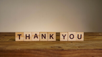 THANK YOU wording on wooden table