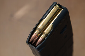 High capacity 30 round bullet magazines for an AR-15 semi-auto assault rifle guns with .223 and...
