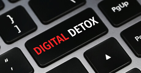 Conceptual hand writing showing Digital Detox. Digital detox text on a keyboard.