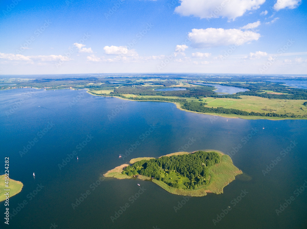 Poster aerial view of beautiful island on swiecajty lake in the neighborhood of kal village, mazury, poland