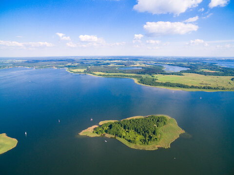 Aerial view of beautiful island on Swiecajty Lake in the neighborhood of Kal village, Mazury, Poland (former Kehlen or Kielno, East Prussia) © Mariusz Świtulski