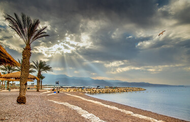 Morning at central public beach in Eilat – famous tourist resort and recreational city in Israel, Middle East