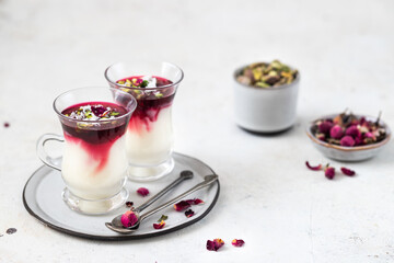 Malabi (muhallebi) milk pudding with pistachios. Arabic desert