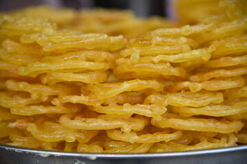 Jalebi is a popular Indian dessert made with flour sugar syrup. Served during festivals and special occasions, This traditional dessert crispy sugary spiral tastes brilliant when served with hot milk