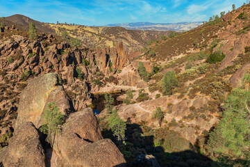 Rock formations in Pinnacles National Park in California, the destroyed remains of an extinct volcano on the San Andreas Fault. Beautiful landscapes, cozy hiking trails for tourists and travelers.