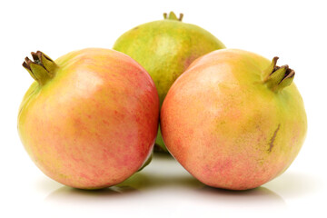 Ripe pomegranate fruit isolated on white 