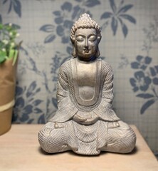 Fototapeta premium Buddha Statue. Buddhism is a path of spiritual development leading to Insight into the true nature of reality, changing yourself in order to develop the qualities of awareness, kindness, and wisdom